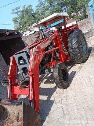Massey Ferguson 385 with bucket