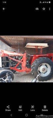 Massey Ferguson 385 with bucket